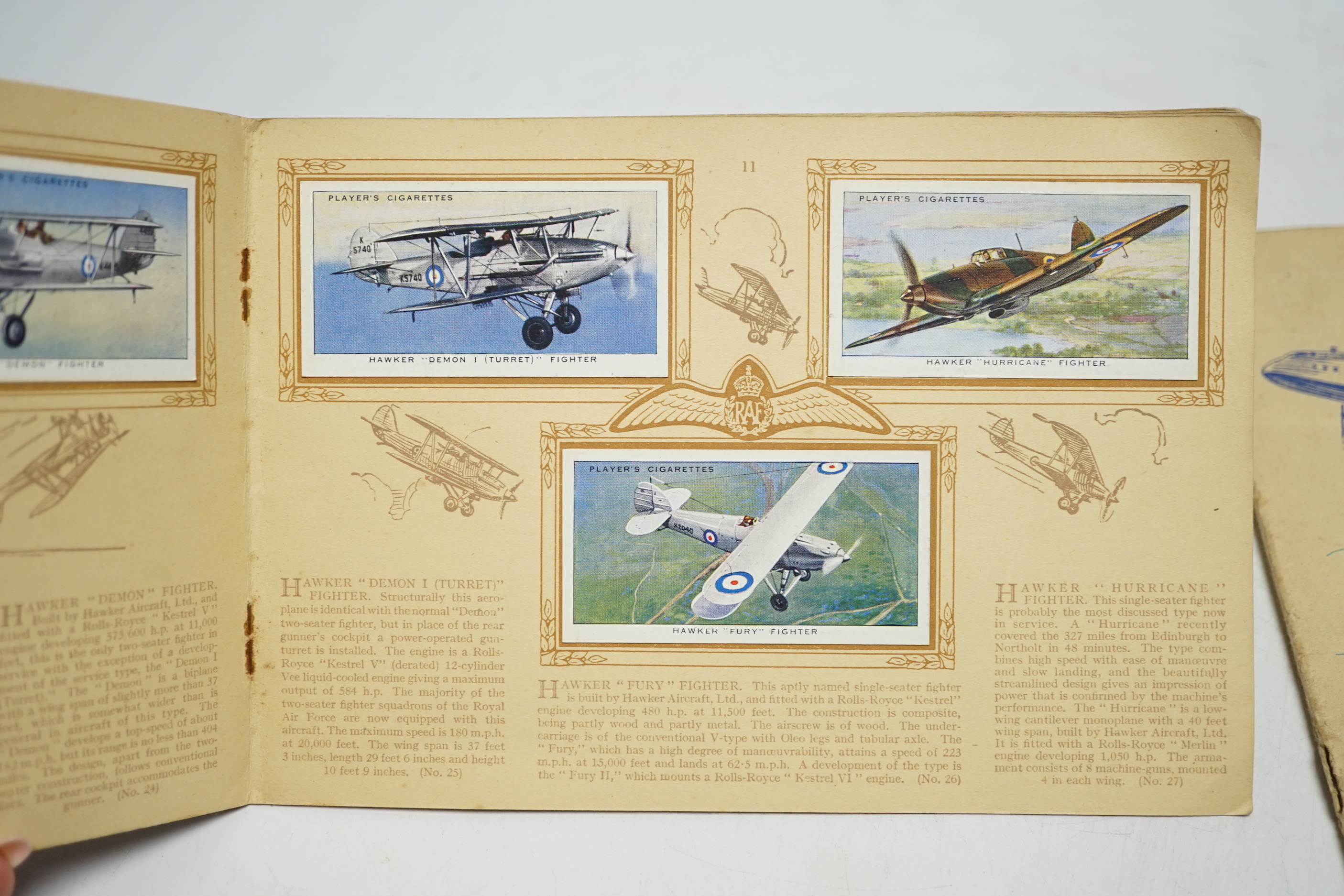 A collection of cigarette card albums